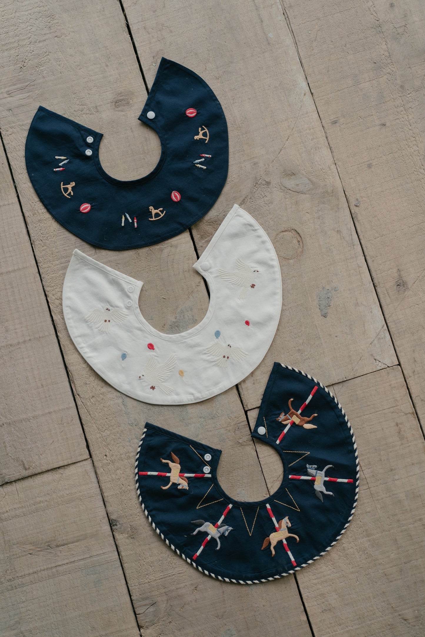 Embroidered Collar Bib - Rocking Horse